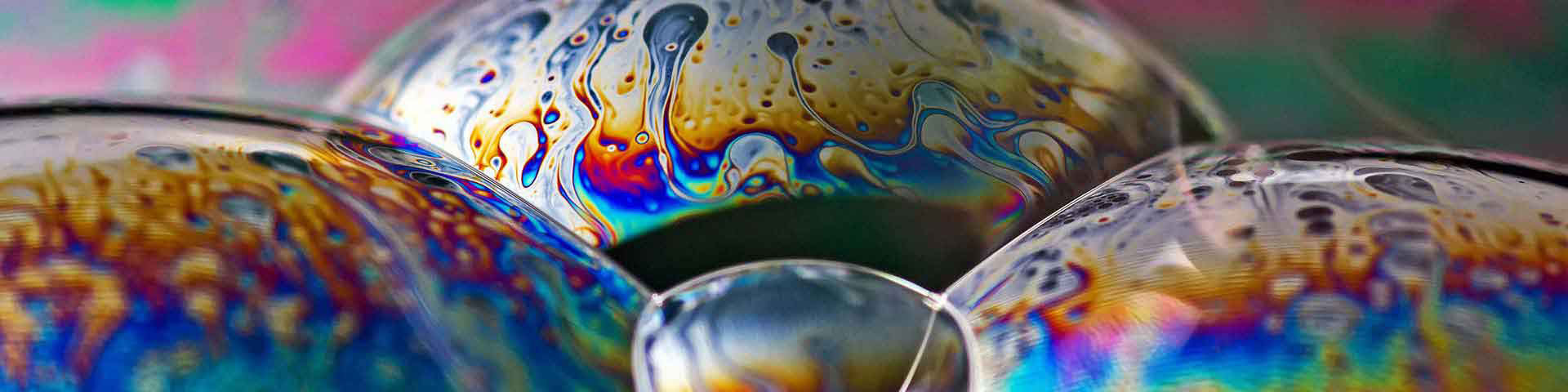 Soap bubbles displaying colorful interference patterns on thin liquid films